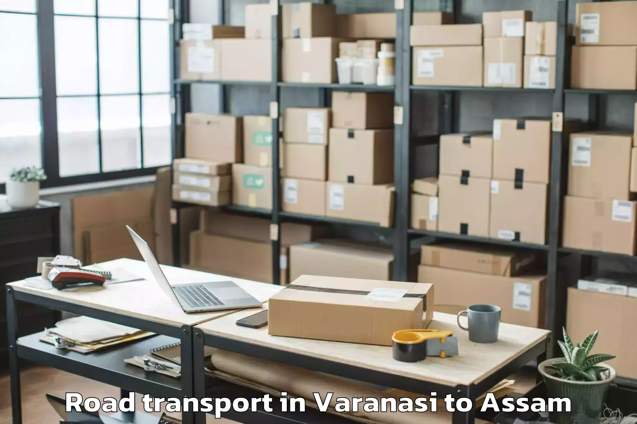 Book Varanasi to Lumding Railway Colony Road Transport Online